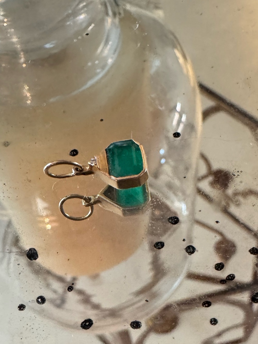Emerald charm with 14 k gold and diamond accent
